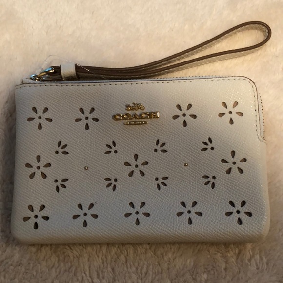 Coach Handbags - Coach cornerzip perforated wristlet ivory LAST ONE